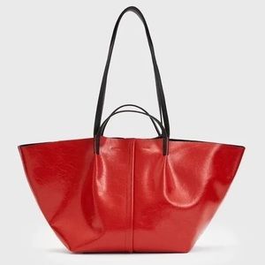 Authentic All Saints red leather tote comes with a purse in the bag.